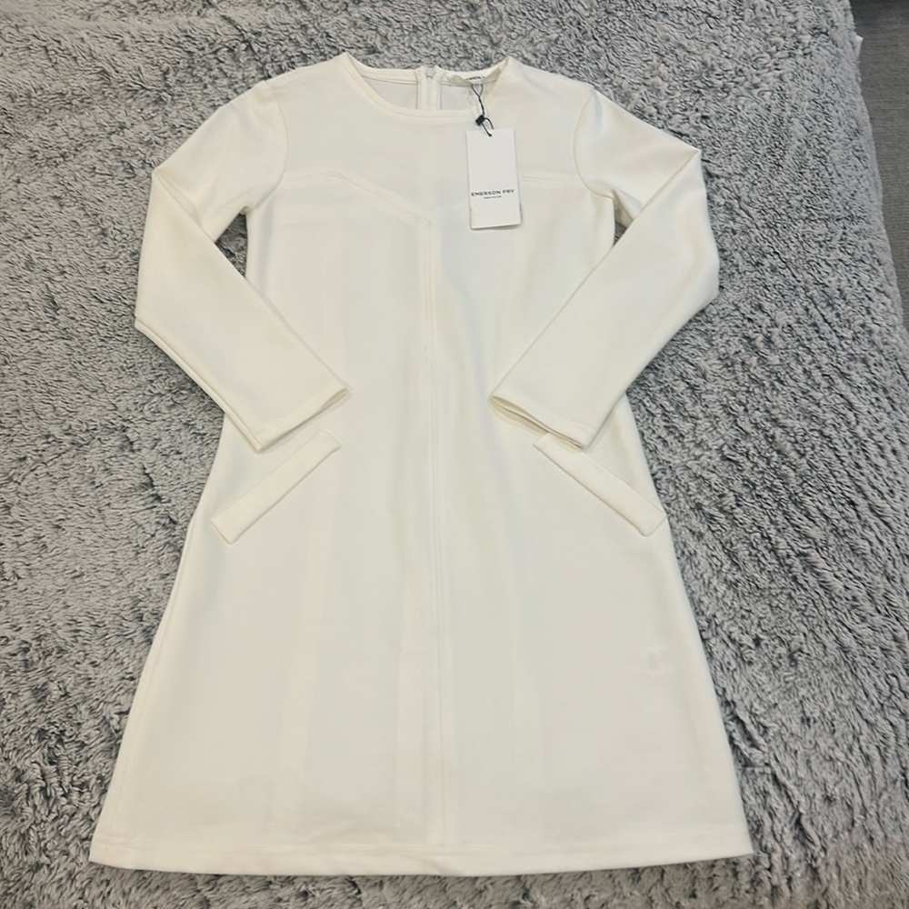 XXS white long sleeve pernille dress. Never worn before, still has tags.